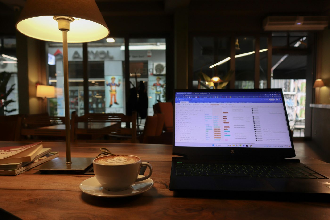 Freelancer working on laptop in a Seoul cafe